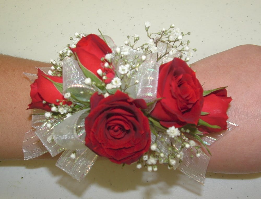 red wrist corsage